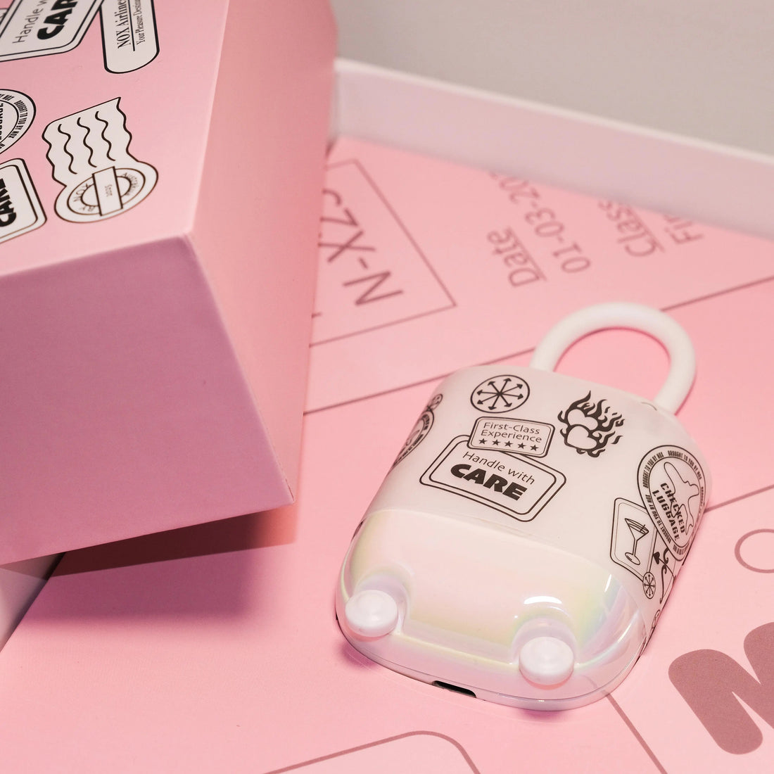 Pastel NOX Traveller date-night box and suitcase-style case, packed and ready for a weekend away.