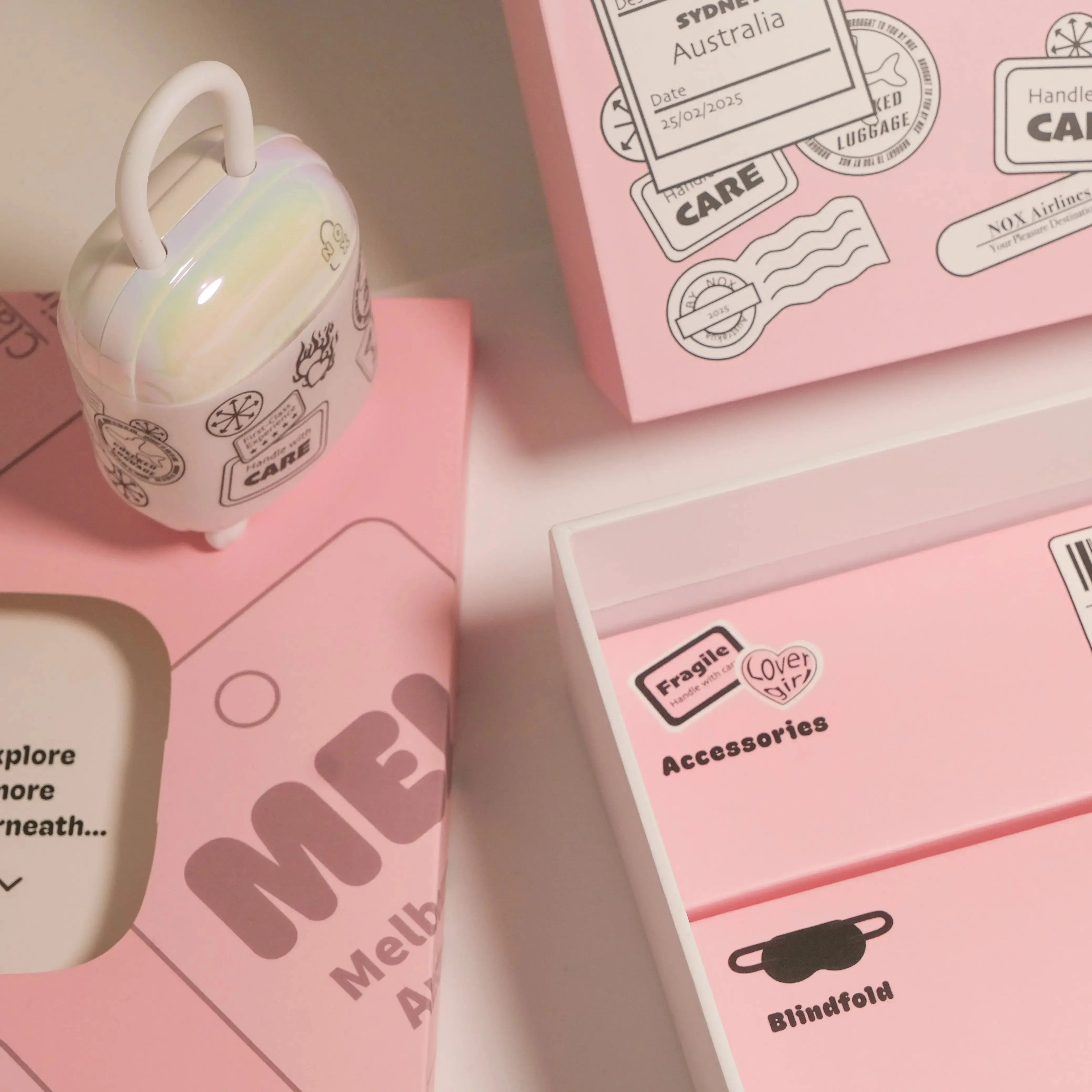 Pink packaging with 'CARE' branding and a small white product on a light pink background